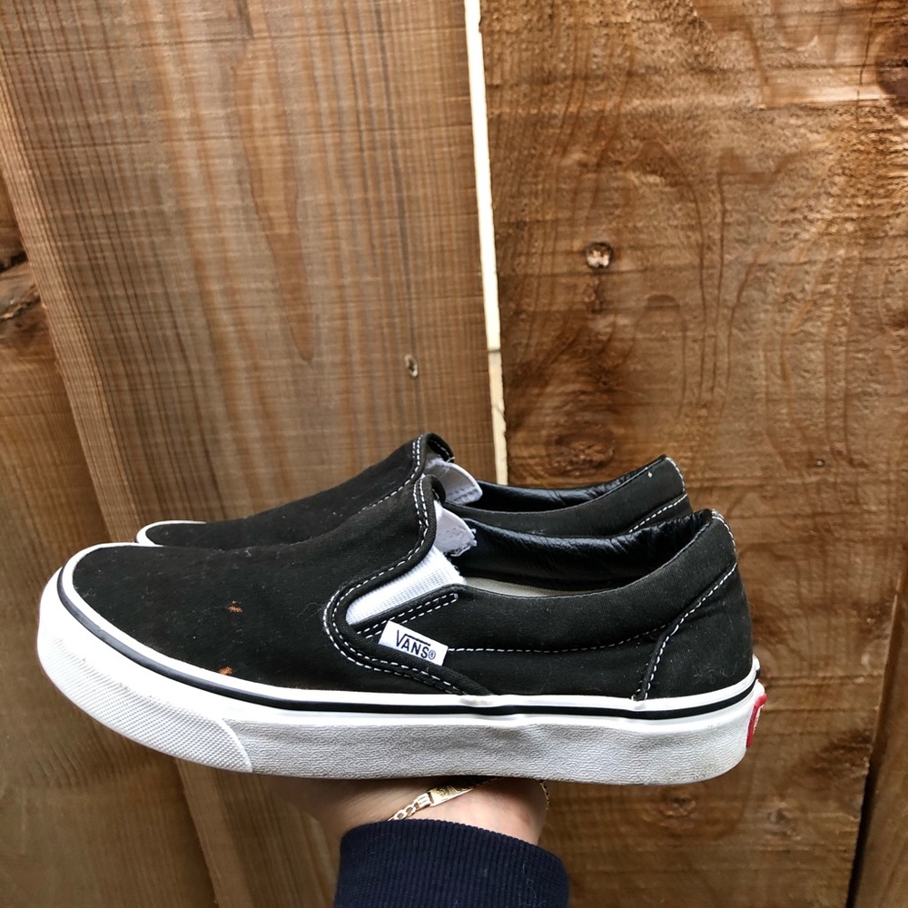 black & white slip on vans